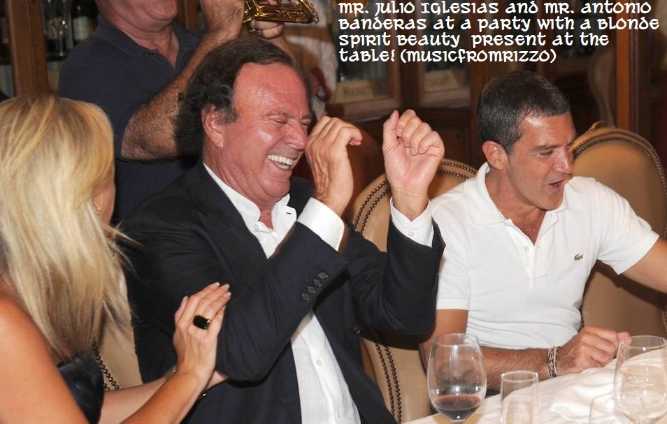 Julio Iglesias and Antonio Banderas at party